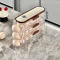 Three-layer clear plastic automatic rolling egg storage box with 31x10x20.5cm dimensions - Single Row 3 Layers