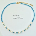 Beaded necklace with natural pearls and sky blue crystals on white background - Sky Blue Beaded Pearl (1184)