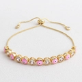 Detail of adjustable gold-plated evil eye bracelet with pink enamel and slider clasp - Pink
