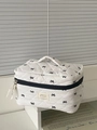 Trousse de maquillage blanche matelassée à nœuds noirs avec poignée et grande capacité - Grande trousse de maquillage portable