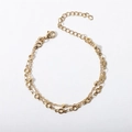 Detail of gold double-layered bracelet with metal beads and adjustable lobster clasp - 17+5cm / Cross Bead Chain + Hollow Circle Bracelet / Gold