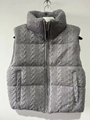 Close-up of gray cable-knit vest showing the zipper detail and high stand-up collar - XS / Tops / Gray