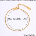 Dettaglio bracciale a catena box dorata con estensione 17+5cm e chiusura a moschettone - Perla finta dorata