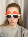 Selfie shot of festive Christmas hat party glasses with Merry Christmas text on the frame - Letter with Double Christmas Hat