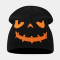 Close-up of black knit beanie featuring a festive orange pumpkin face embroidery - Style C Black+Orange (Jack-O-Lantern)