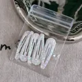 Lot de cinq barrettes à cheveux gouttes blanches pailletées dans un sachet - Blanc / Goutte d'eau blanche