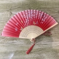 Red cherry blossom and butterfly pattern wooden folding fan with tassel decoration - No.30 Attracting Butterflies