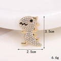 Detailed view of a gold dinosaur charm with white rhinestones measuring 3.5cm by 2.5cm - Gold Rhinestone Dinosaur