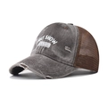 Detailed side view of distressed trucker cap with mesh back and embroidered slogan - Adjustable / Coffee