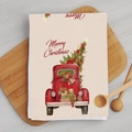 Detail of Christmas microfiber kitchen towel with red truck carrying tree and gifts - Retro Truck Christmas Tree