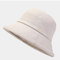 Chic beige bucket hat featuring a textured finish and a gold metal logo emblem - M (56-58cm) / Beige
