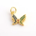 Macro shot of gold butterfly pendant with colorful zircons for DIY jewelry making - Blue Green Pink Gemstone Gold Butterfly Style (11)