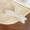 White butterfly acetic acid hair claw clip on a textured wooden tray for elegant styling - Mermaid White 11CM