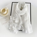 Detail of white cotton linen scarf texture with elegant coffee cup and minimalist frame - Snow White