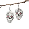 Colorful embossed acrylic skull earrings with red heart eyes for Halloween fashion - Black and White with Red Heart