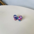 Detail of acetate butterfly hair clip with colorful marble pattern and small rhinestones - Pink Blue Floral Butterfly