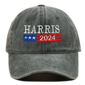 Macro detail of high-density Harris 2024 embroidery on washed grey cotton baseball cap - Green