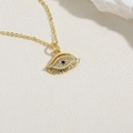 Collana con ciondolo malocchio dorato e cristalli di zircone su base di pietra beige - Occhio del male / Oro