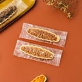 Nougats in transparent polka dot packaging bags on a warm reddish background - Frosted Polka Dot / Pack of 100