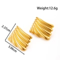 Minimalist gold four-leaf clover stud earrings with textured shell stripes for women - Shell Texture Arched Style (YE-075) / Gold