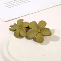 Close-up of matte olive green double flower hair claw clip on a ceramic tray - Double Flower Clip - Matte Mustard Green