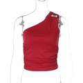 Detail of red one-shoulder crop top featuring metallic pins and pearl bead accents - S / Red