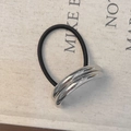 Minimalist black elastic hair tie with a sleek double-layered silver geometric metal ring - Metallic Parallel Silver Style