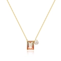 Detail of gold necklace featuring gradient rectangular zircon and white pearl pendant - Gradient Cube Gold