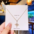 Collier élégant en titane plaqué or avec un pendentif étoile scintillant en zircon - Étoile à huit branches argentée