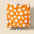 Detail of soft orange flannel blanket with festive white ghost cat patterns - Style 59 (Halloween Orange Ghost Cat)