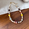 Collana vintage con perline irregolari in agata e guscio di cocco e trame di pietra - Oro Stile 2