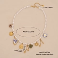Collana barocca di perle boho con ciondoli a cuore floreale e sole dorato - Stile 3 (Combo Motivo Astratto)