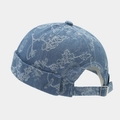 Detail of blue denim brimless cap showing white floral patterns and metal buckle - Blue Background White Floral Style (4#色)