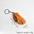 Realistic fried chicken wing keychain pendant with crispy texture and golden finish - Chicken Wing Keychain