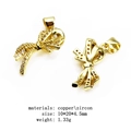Golden copper bow pendant with micro-set cubic zirconia stones and size parameters - Bow (12)