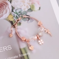 Detail of rose gold snake chain bracelet with heart, clover, and floral charms - Rose Gold Fairy Four-Leaf Clover Pendant Style (7#)