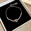 Elegant adjustable silver bracelet with a red heart-shaped zircon pendant and small diamonds - Silver-Red
