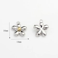Detailed size view of silver and gold flower charms measuring 16mm by 14mm for DIY jewelry - Silver Flower (Gold Center)