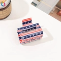 Detail of a rectangle claw clip featuring a glossy US flag star and stripe pattern - Stars Stripes Flag Clip - 5cm Square