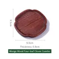 Ebony wood clover shaped coaster with 9.5cm diameter and elegant carved texture - Ebony Four-leaf Clover Coaster