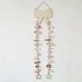 Pink ribbon hair clip holder with a wooden bow plate displaying various cute hair clips - Bowknot Style