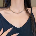 Minimalist silver geometric tube necklace worn by a model showcasing the V-shaped drape - Silver Minimalist Geometric Tube Style