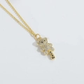 Elegant gold bear pendant necklace with sparkling white zircons and black crystal accents - Raccoon
