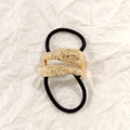 Golden irregular texture metal hair tie with black elastic band on white background - Gold Liquid Double Band 5cm