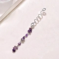 Détail de la spirale à cheveux argentée avec pendentif en améthyste violette naturelle - Base Argent Violet Foncé Long