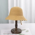 Japanese style yellow woven bucket hat for women on wooden stand for sun protection - M (56-58cm) / Wheat