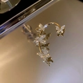 Elegante ear cuff a farfalla dorata con strass scintillanti per orecchi non forati - Clip per orecchio destro oro