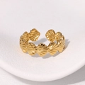 Adjustable golden shell pattern ring in stainless steel with a polished ocean-inspired design - Gold