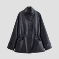 Chaqueta de cuero negra de largo medio con cintura ajustable y cuello alto elegante - XS / Negro