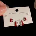 Close-up of S925 silver needle stud earrings set with red teardrop glaze and zircons - Silver-Red Rhinestone Geometric Set (37#)